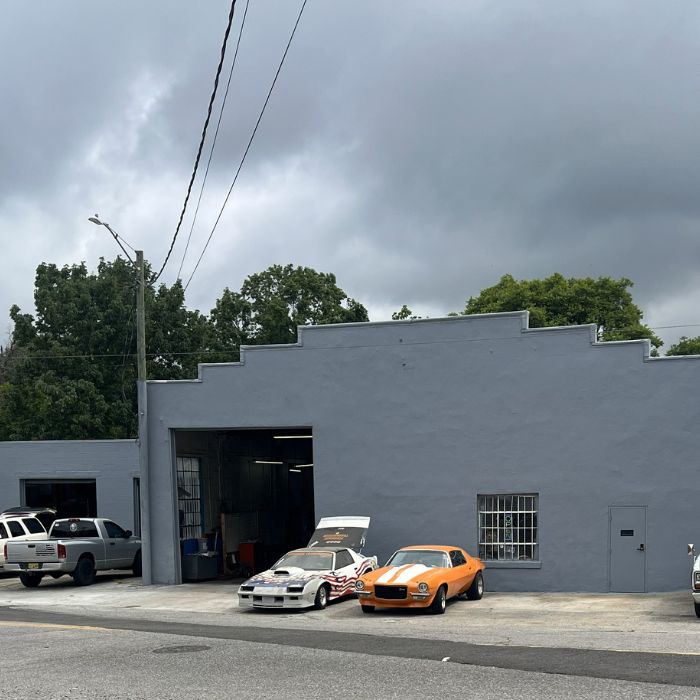 Garage exterior with customer vehicles